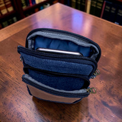 Bidora two-tone blue denim crossbody phone pouch with zippered compartments and internal smartphone storage