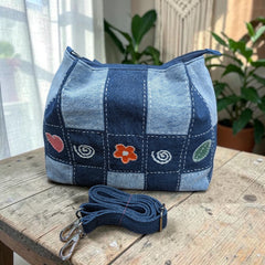 Bidora patchwork denim shoulder bag with checkerboard pattern, hand-stitched embroidery, and detachable strap.