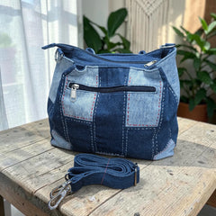 Bidora patchwork denim shoulder bag with checkerboard blue pattern, embroidered details, and detachable strap.